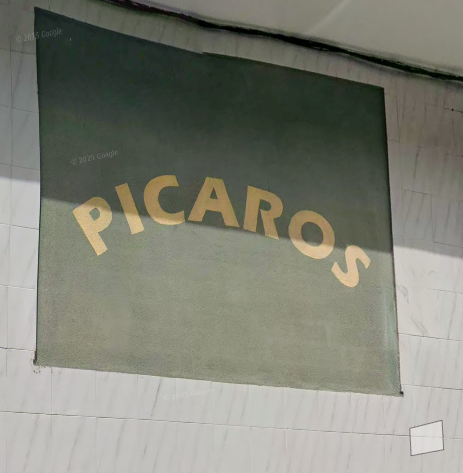 Cartel Pícaros en la tienda